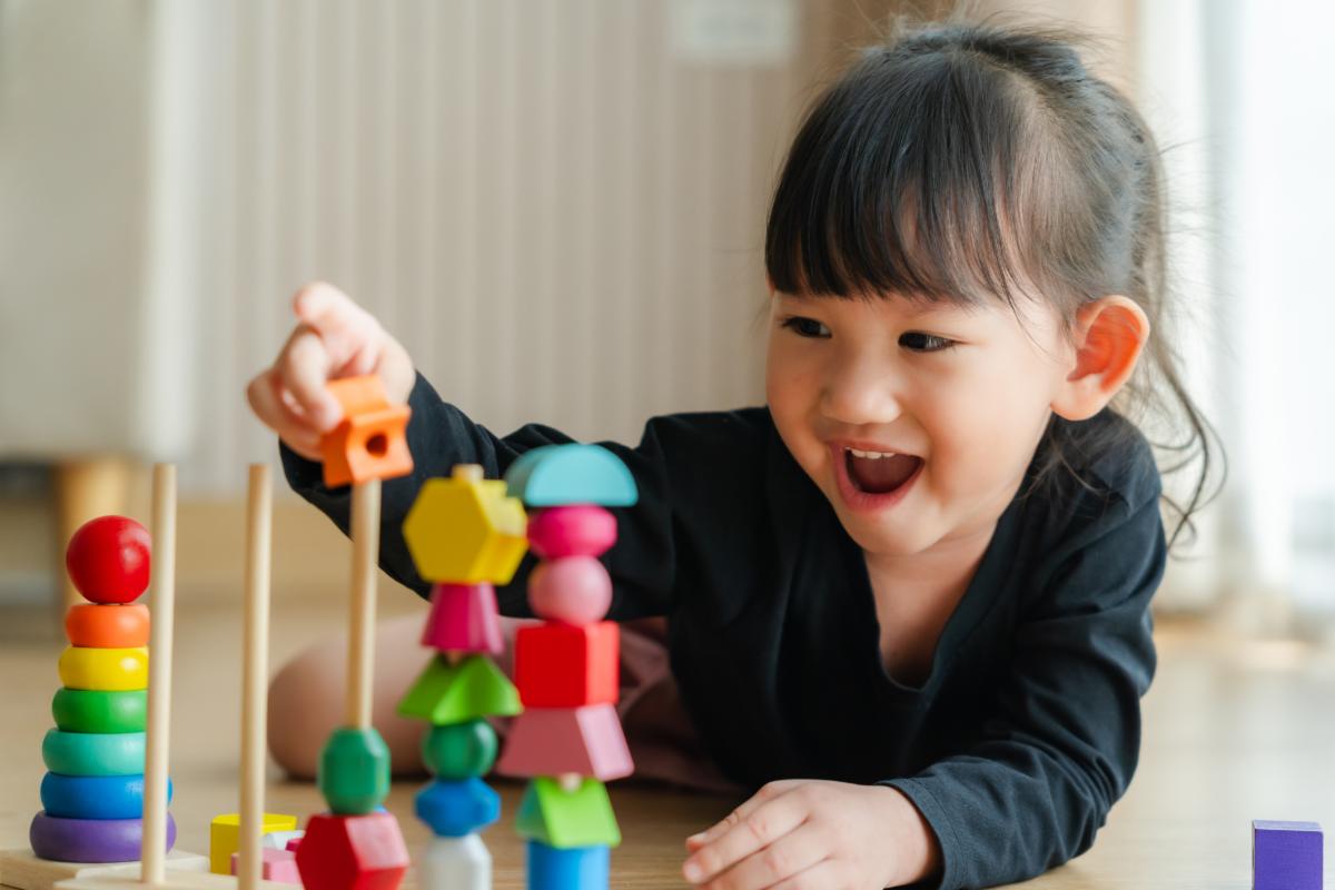 Girl Playing with Blocks